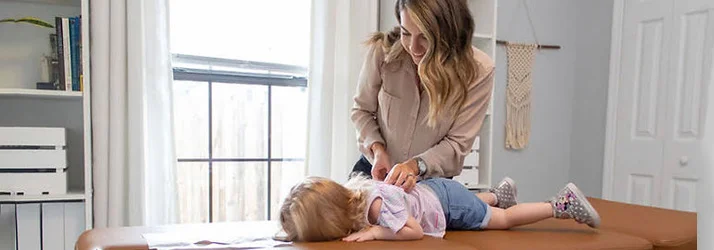 Chiropractor DeLand FL Katherine Burtis Adjusting Child Chiropractor DeLand FL Katherine Burtis Adjusting Child